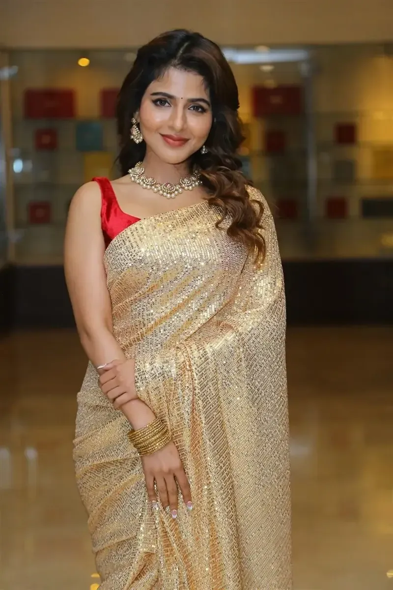 ISWARYA MENON IN GOLD COLOR SAREE AT SPY MOVIE RELEASE EVENT